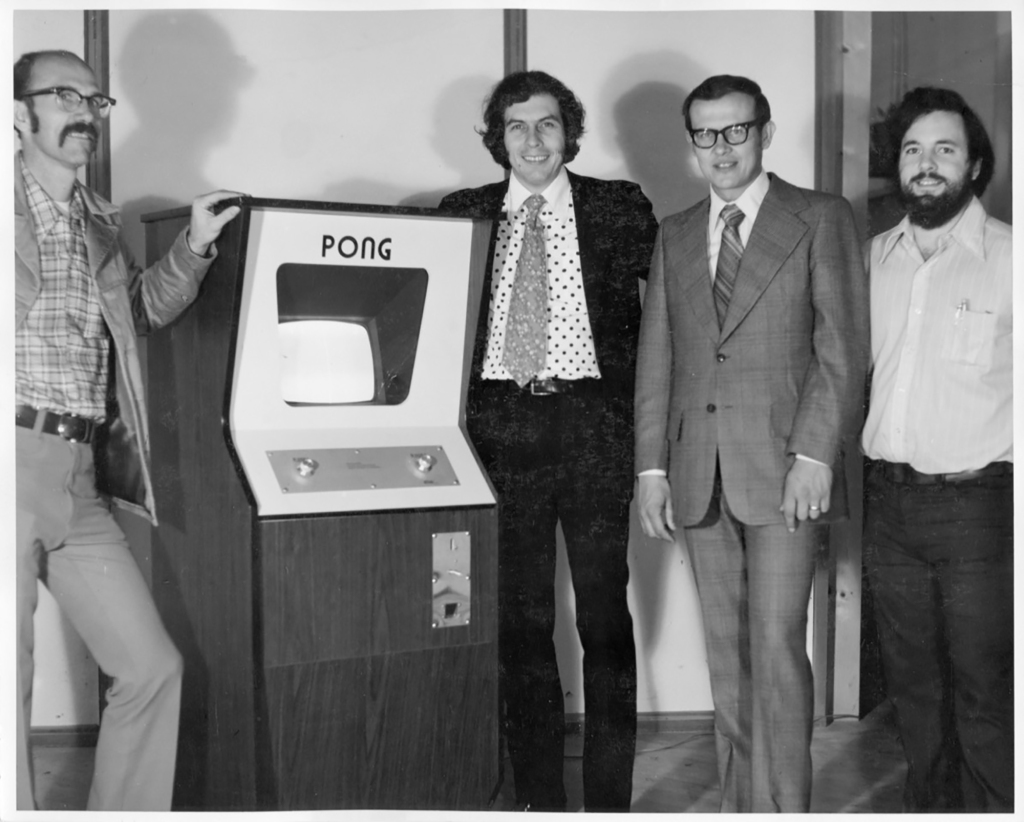 Alcorn (far right) with Atari co-founders Ted Dabney (from left) and Nolan Bushnell and employee Fred Marincic, with an early Pong console.
