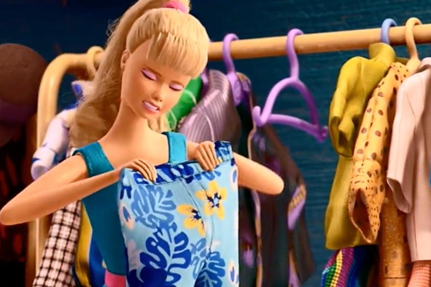 The video shows a clip from the 2010 film where Barbie ripping a tied-up Ken's outfits with the latter screaming one of two things.