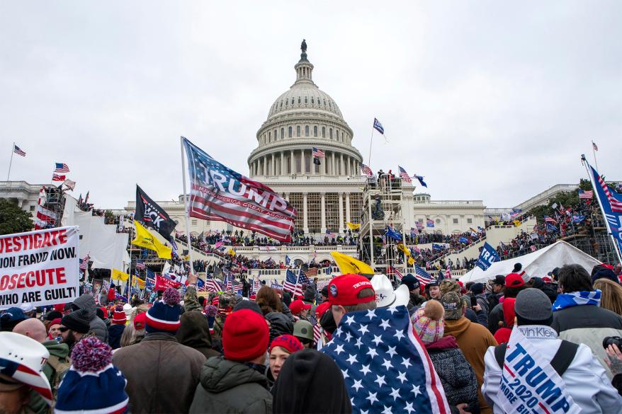A file photo of the US Capitol on Jan. 6, 2021, when rioters briefly took over the Capitol building. Many politicians believe Trump is responsible for the events.