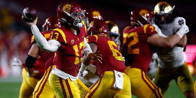 Caleb Williams #13 of the USC Trojans throws against the Notre Dame Fighting Irish in the first half at United Airlines Field at the Los Angeles Memorial Coliseum on November 26, 2022 in Los Angeles, California.