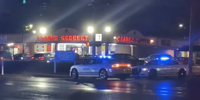 Police cars at shooting of officer at Memphis gas station.