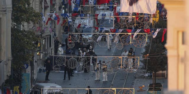 People leave the area after an explosion on Istanbul's popular pedestrian Istiklal Avenue, Sunday, Nov. 13, 2022.