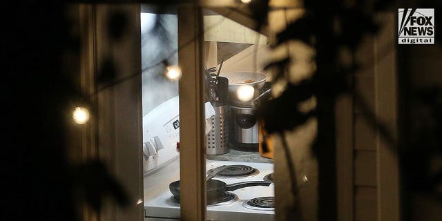 View into the house on 1122 King Road, Moscow, Idaho, on Nov. 14, 2022. The home is sealed up following a quadruple homicide involving four University of Idaho students.