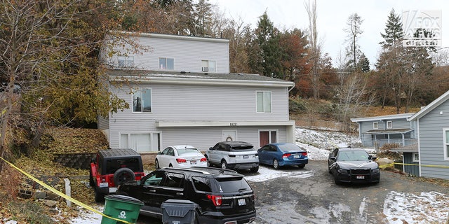 Law enforcement vehicles on the scene of the Idaho quadruple murder.