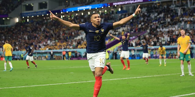 Kylian Mbappe of France celebrates scoring the 3rd goal during the FIFA World Cup Qatar 2022 Group D match between France and Australia at Al Janoub Stadium on November 22, 2022 in Al Wakrah, Qatar.