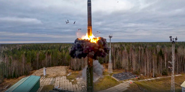 In this handout photo taken from video released by Russian Defense Ministry Press Service on Wednesday, Oct. 26, 2022, a Yars intercontinental ballistic missile is test-fired as part of Russia's nuclear drills from a launch site in Plesetsk, northwestern Russia.