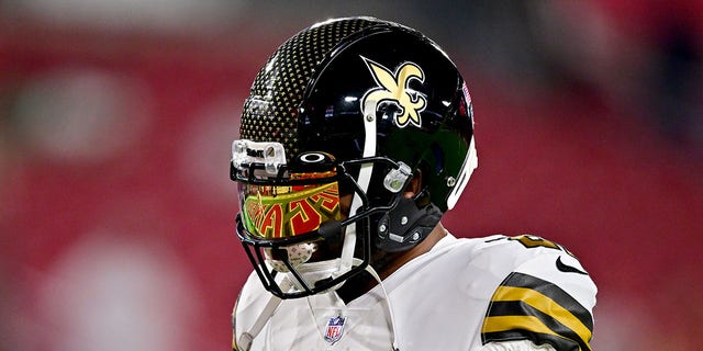 Mark Ingram II #22 of the New Orleans Saints warms up prior to the game against the Tampa Bay Buccaneers at Raymond James Stadium on December 5, 2022, in Tampa, Florida. 