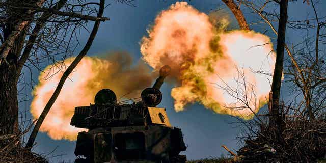 A self-propelled artillery vehicle fires near Bakhmut, Donetsk region, Ukraine, on Nov. 9, 2022.