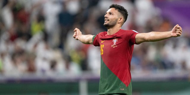 Gonçalo Ramos of Portugal celebrates after scoring his side's fifth goal and his third to make the score 5-0 during a FIFA World Cup Qatar 2022 round of 16 match against Switzerland at Lusail Stadium Dec. 6, 2022, in Lusail City, Qatar.