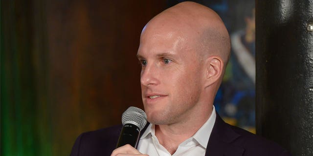 Grant Wahl speaks on a panel discussion at the 2014 Kicking + Screening Soccer Film Festival on April 8, 2014, in New York City.