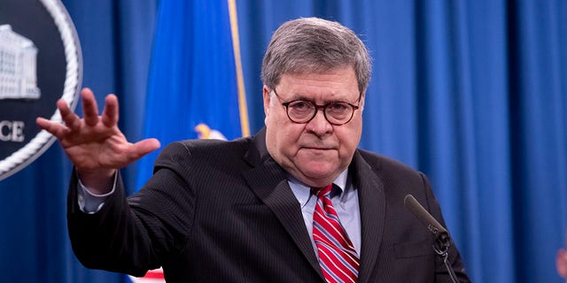 FILE: US Attorney General Bill Barr holds a news conference to provide an update on the investigation of the terrorist bombing of Pan Am flight 103 on the 32nd anniversary of the attack, at the Department of Justice December 21, 2020, in Washington, DC. 