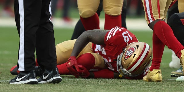 Deebo Samuel #19 of the San Francisco 49ers is injured during the second quarter against the Tampa Bay Buccaneers at Levi's Stadium on December 11, 2022 in Santa Clara, California. 