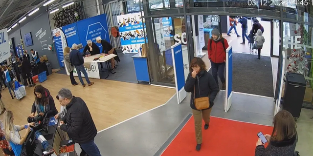 Ken DeLand is seen walking into a Decathlon sports store in Montelimar, France, on Dec. 3, 2022. 