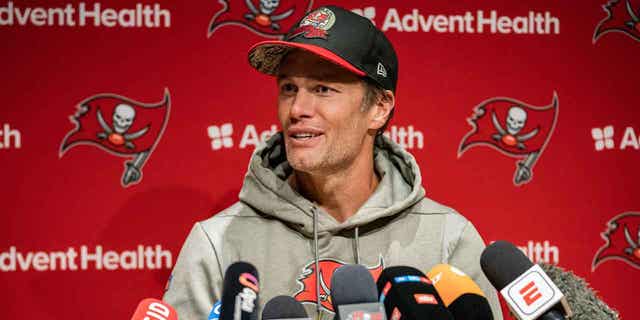 Tom Brady speaking at a press conference at FC Bayern Campus following a game against the Seattle Seahawks on Nov. 11, 2022, in Munich, Germany. Critics have questioned whether Brady’s age will play a role in his potential decline.