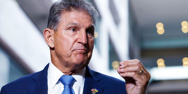 Sen. Joe Manchin speaks to reporters in the Hart Senate Office Building in Washington.