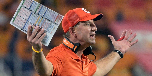 Clemson head coach Dabo Swinney reacts on the sideline after a play during the first half of the Cheez-It Bowl against Iowa State Dec. 29, 2021, in Orlando, Fla.