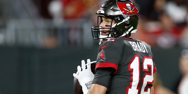 Tom Brady, #12 of the Tampa Bay Buccaneers, looks to pass against the Cincinnati Bengals during the third quarter at Raymond James Stadium on Dec. 18, 2022 in Tampa, Florida.