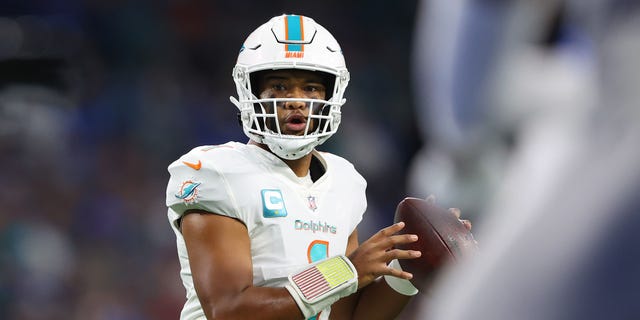 Tua Tagovailoa #1 of the Miami Dolphins looks to pass against the Detroit Lions during the first quarter at Ford Field on October 30, 2022, in Detroit, Michigan.