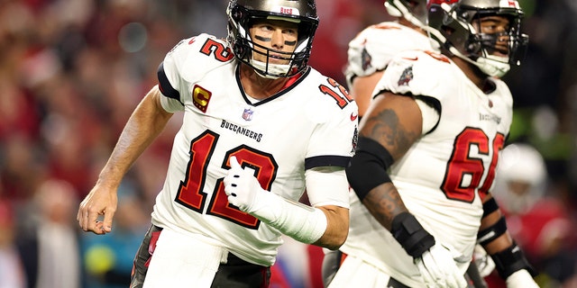 Tom Brady (12) of the Tampa Bay Buccaneers reacts after a turnover on downs during the first quarter of a game against the Arizona Cardinals at State Farm Stadium Dec. 25, 2022, in Glendale, Ariz. 