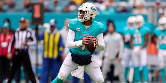 Tua Tagovailoa, #1 of the Miami Dolphins, looks to pass against the Green Bay Packers during the second half of the game at Hard Rock Stadium on Dec. 25, 2022 in Miami Gardens, Florida.