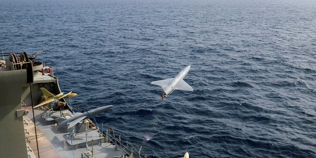 A drone is launched from an Iranian military ship during a military exercise in an undisclosed location in Iran, in this handout image obtained on Aug. 25, 2022.