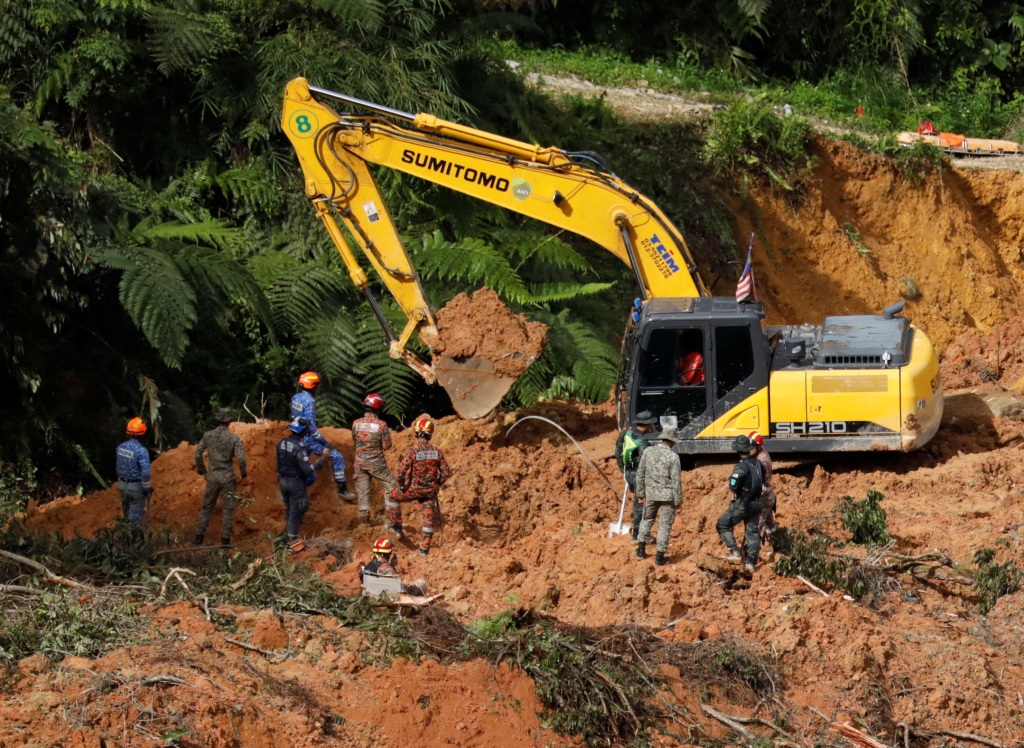 The landslide swept through a campground early Friday morning, 30 miles from the Malaysian capital.