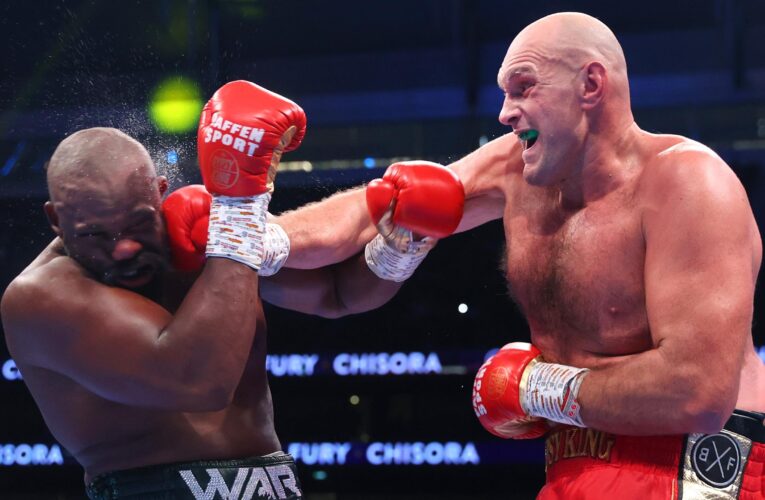 Tyson Fury stops Derek Chisora to retain WBC heavyweight title, stares down Oleksandr Usyk in ring