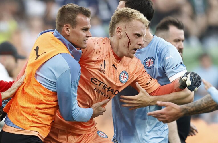 Shocking scenes in Australia as goalkeeper attacked and match abandoned in Melbourne derby