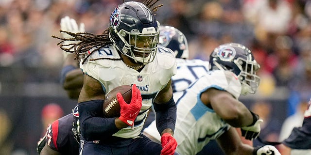 Tennessee Titans running back Derrick Henry runs 29 yards for a touchdown against the Houston Texans during the first half of a game Oct. 30, 2022, in Houston.