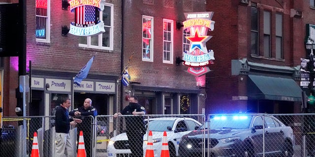 Police block off a part of the Broadway tourist district Monday, Dec. 28, 2020, as a result of a bombing that took place on Christmas Day in Nashville, Tenn. The explosion sparked shock across the country, killed the bomber, injured three other people and damaged dozens of buildings. Yet for those who call Music City home, the bombing feels like a cruel capstone to an already dark year. 