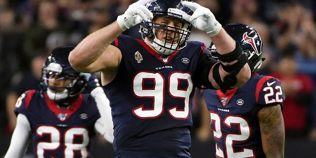 Houston Texans defensive end J.J. Watt (99) celebrates during the second half against the Buffalo Bills in Houston, Jan. 4, 2020.