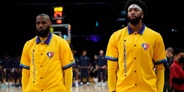 Los Angeles Lakers forward LeBron James, left, and forward Anthony Davis stand together before a game against the New Orleans Pelicans in Los Angeles April 1, 2022.