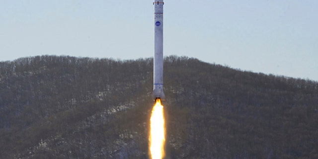 This photo provided by the North Korean government, shows what it says a test of a rocket with the test satellite at the Sohae Satellite Launching Ground in North Korea Sunday, Dec. 18, 2022. 