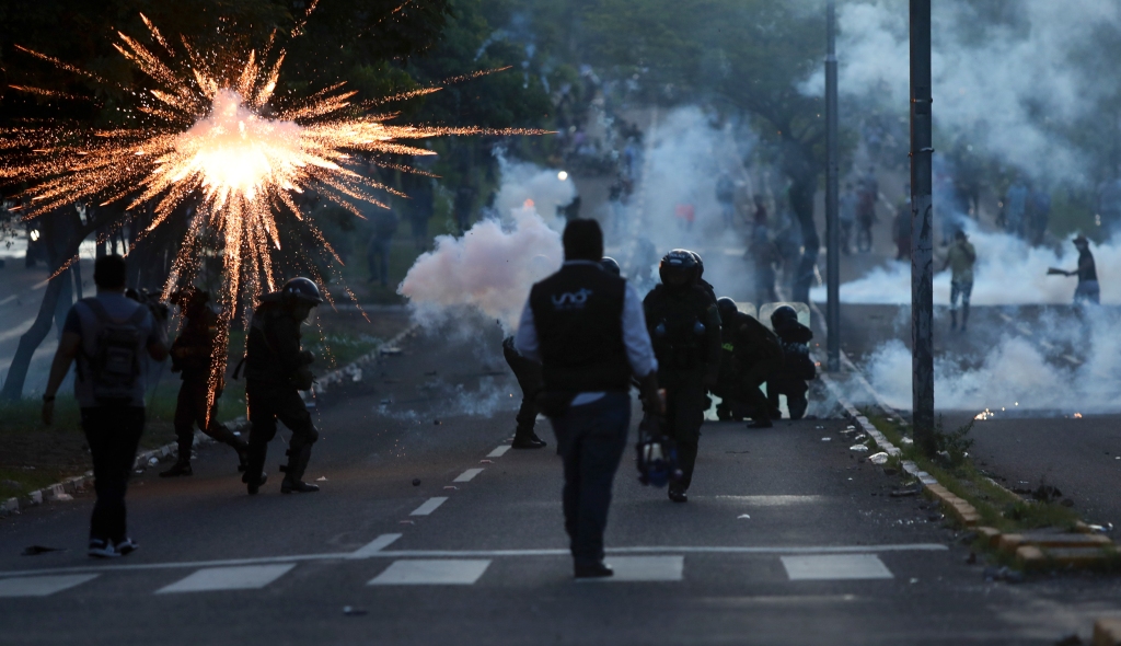Police clash with protesters in Santa Cruz, Bolivia. 