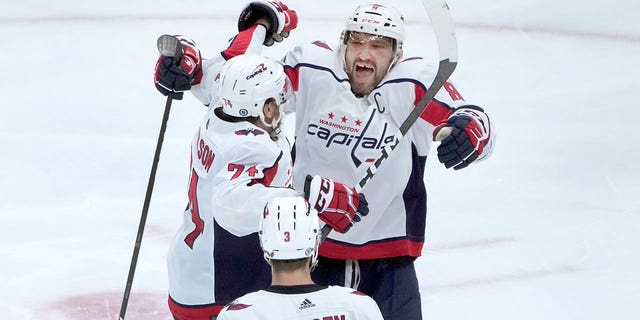 Washington Capitals' Alex Ovechkin celebrates his 800th career goal, on a hat trick against the Blackhawks, Tuesday, Dec. 13, 2022, in Chicago.