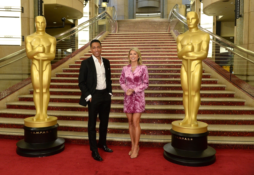 A picture of TJ Holmes and Amy Robach at The Oscars Previews.