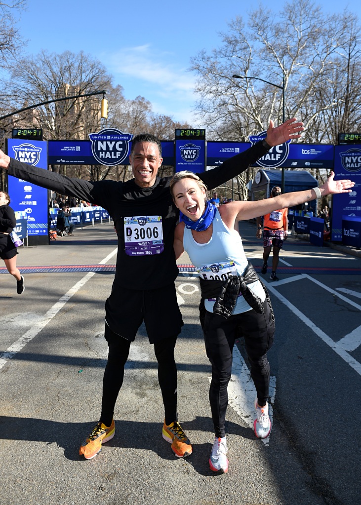 A picture of Holmes and Robach training for a March half-marathon.