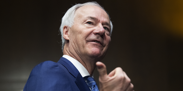 Arkansas Gov. Asa Hutchinson prepares to testify before the Senate Judiciary Committee on June 22, 2021.