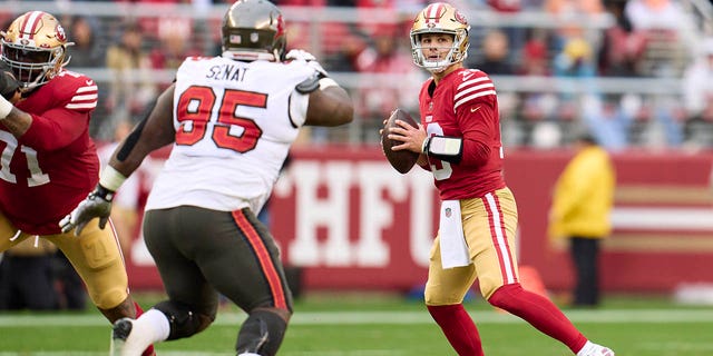 Brock Purdy of the San Francisco 49ers drops back to pass against the Tampa Bay Buccaneers during the first half at Levi's Stadium on Dec. 11, 2022, in Santa Clara, California.