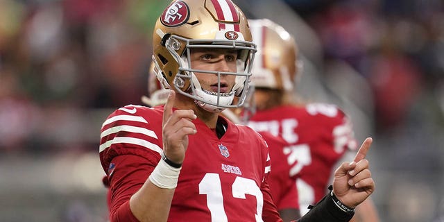 Niners quarterback Brock Purdy looks toward the sideline before running a play against the Tampa Bay Buccaneers in Santa Clara, California, Dec. 11, 2022.