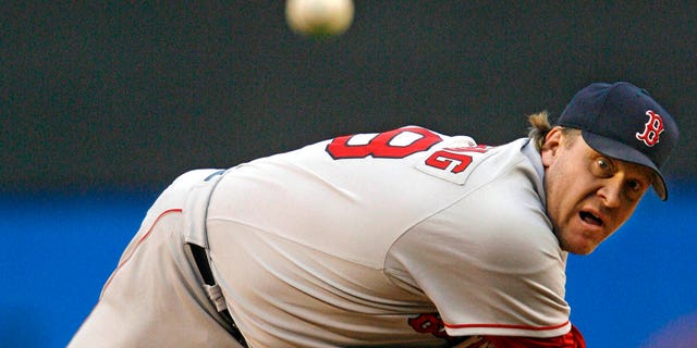 Boston Red Sox starting pitcher Curt Schilling throws during the first inning against the New York Yankees at Yankee Stadium in New York, in this file picture taken May 10, 2006. 