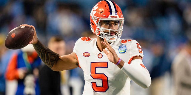 Clemson quarterback D.J. Uiagalelei warms up before the Atlantic Coast Conference championship game against North Carolina on Dec. 3, 2022.