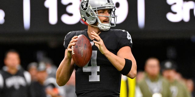 Las Vegas Raiders quarterback Derek Carr (4) throws against the Indianapolis Colts in the first half of a game in Las Vegas Nov. 13, 2022. 