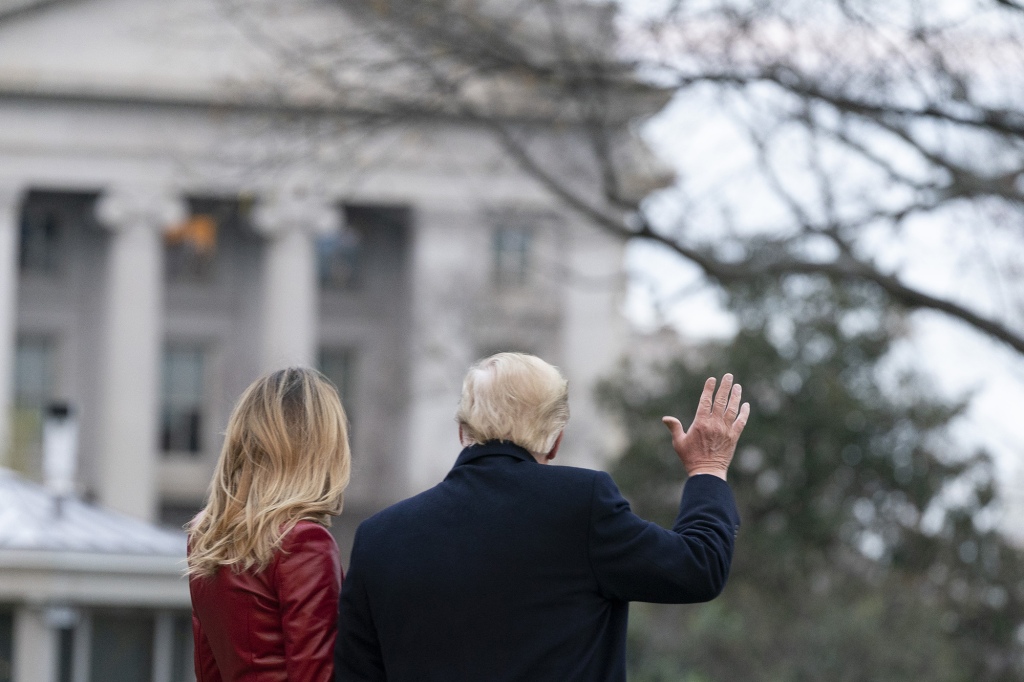 Former President Donald Trump and his wife, Melania Trump, depart the White House on Dec. 5, 2020.