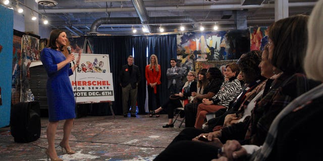 Senator-elect Katie Britt, R-Ala., speaks to a group of supporters at a Women for Herschel event in Atlanta ahead of the Georgia Senate Runoff between Republican Herschel Walker and Democratic Sen. Raphael Warnock on Dec. 1, 2022.