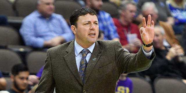 Greg Heiar, then an assistant coach at LSU, signals his players during the First Round of the NCAA Basketball Tournament against the Yale Bulldogs at the VyStar Veterans Memorial Arena on March 21, 2019 in Jacksonville, Florida.  