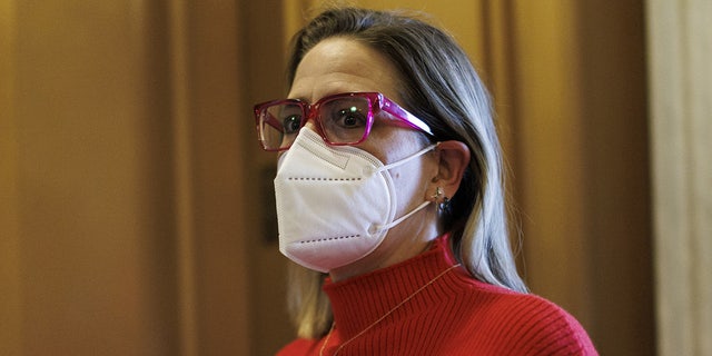 Sen. Kyrsten Sinema, a Democrat from Arizona, arrives at the U.S. Capitol in Washington, D.C., on Jan. 19, 2022.