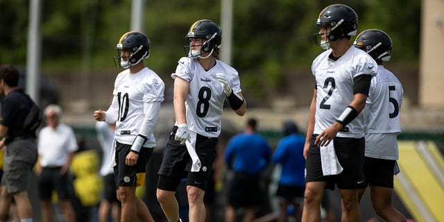 Pittsburgh Steelers quarterback Kenny Pickens (8) takes part in a drill with quarterbacks Mitchell Trubisky (10), Mason Rudolph (2) and Chris Oladokun (5) during the team's practice May 25, 2022, in Pittsburgh.