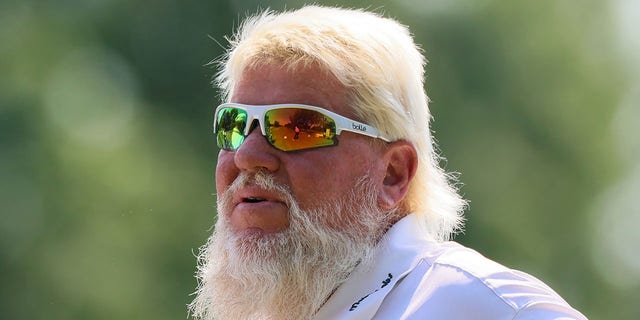 John Daly follows his shot from the 6th tee during the final round of The Ally Challenge at Warwick Hills Golf and Country Club in Grand Blanc, Michigan, on Aug. 28, 2022.