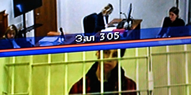 US basketball player Brittney Griner, who was sentenced to nine years in a Russian penal colony in August for drug smuggling, is seen on a screen via a video link from a remand prison during a court hearing to consider an appeal against her sentence, at the Moscow regional court on October 25, 2022.